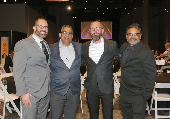 Gabe Martineau, Raj Sundararaman, John Reedy and Ravi Darbha at the Columbus CEO 2023 Top Workplaces awards, held April 19, 2023 at COSI