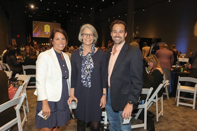 Erin Nealy, Karen Mozenter and Austin Barger at the Columbus CEO 2023 Top Workplaces awards, held April 19, 2023 at COSI