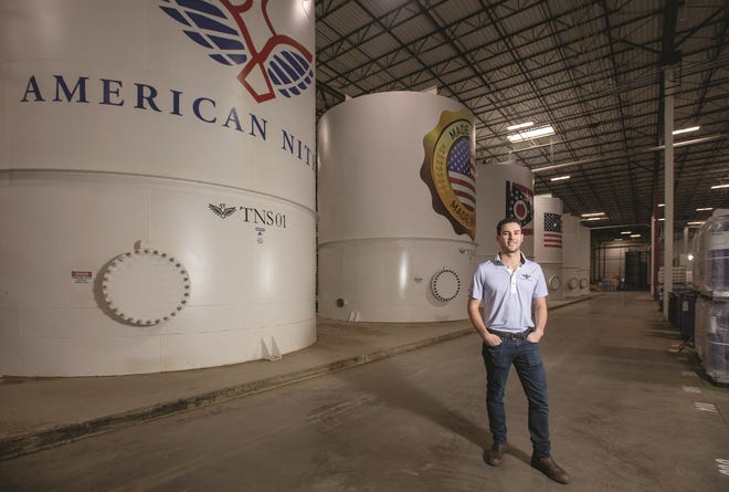 American Nitrile founder Jacob Block in the company’s Grove City manufacturing facility. The tanks contain nitrile butadiene rubber, the raw material used to make disposable gloves. (Tim Johnson/Columbus CEO)