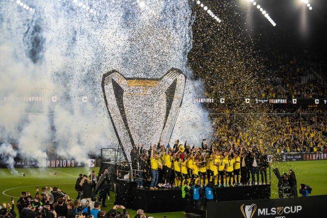 The Columbus Crew and fans celebrate the team’s MLS Cup win at Lower.com Field on Dec. 9.